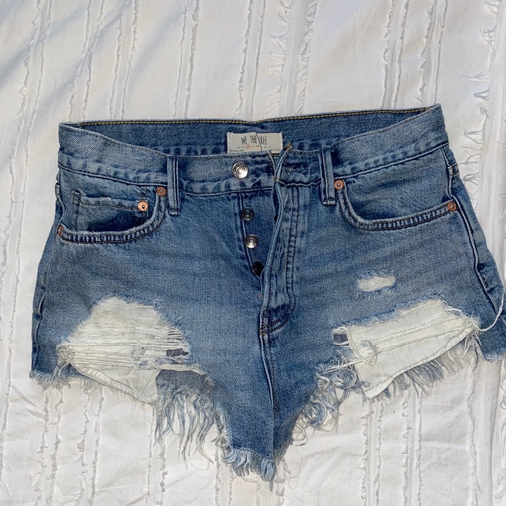 Distressed denim shorts